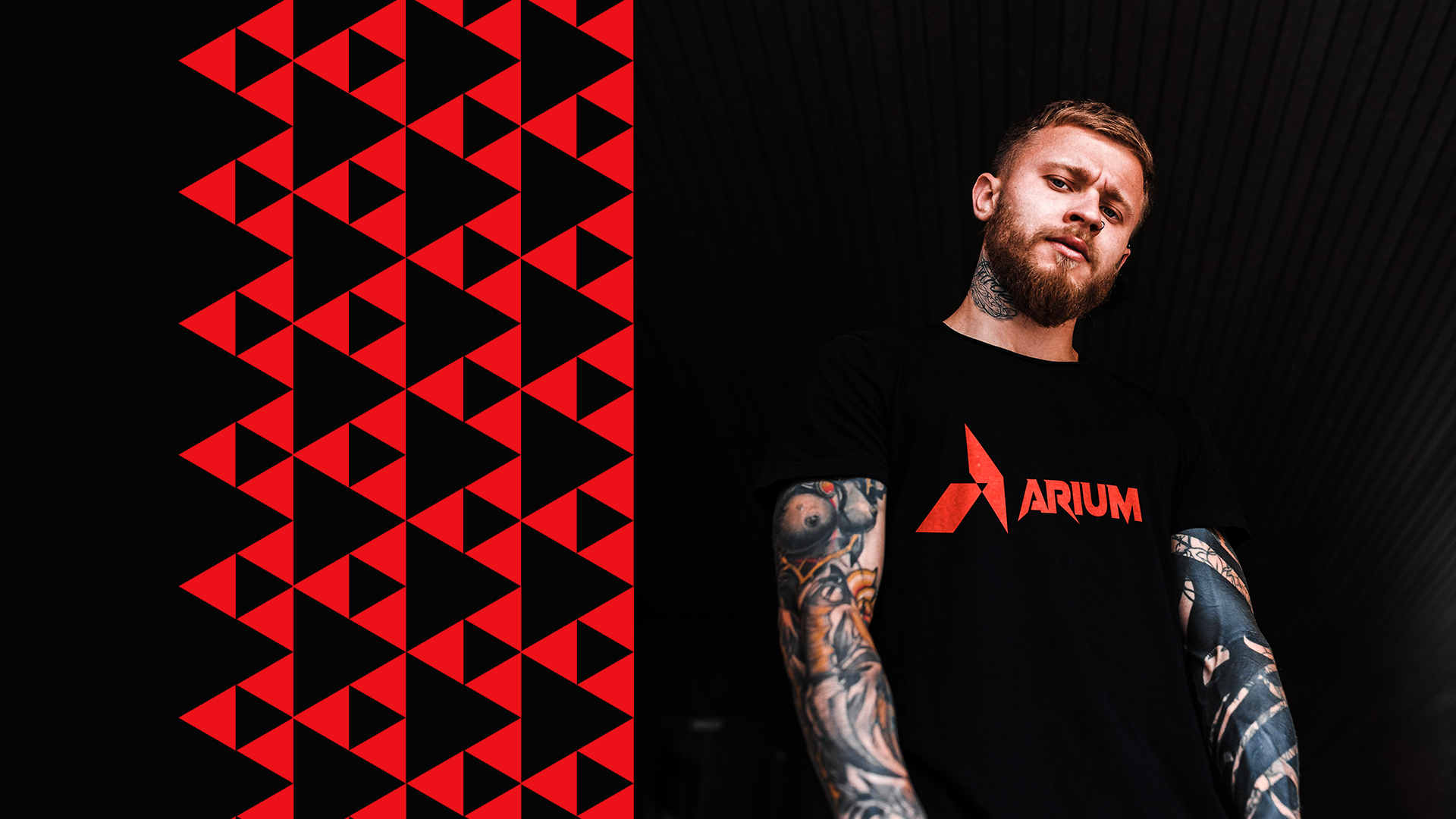 ARIUM team apparel — black t-shirt with red monogram
