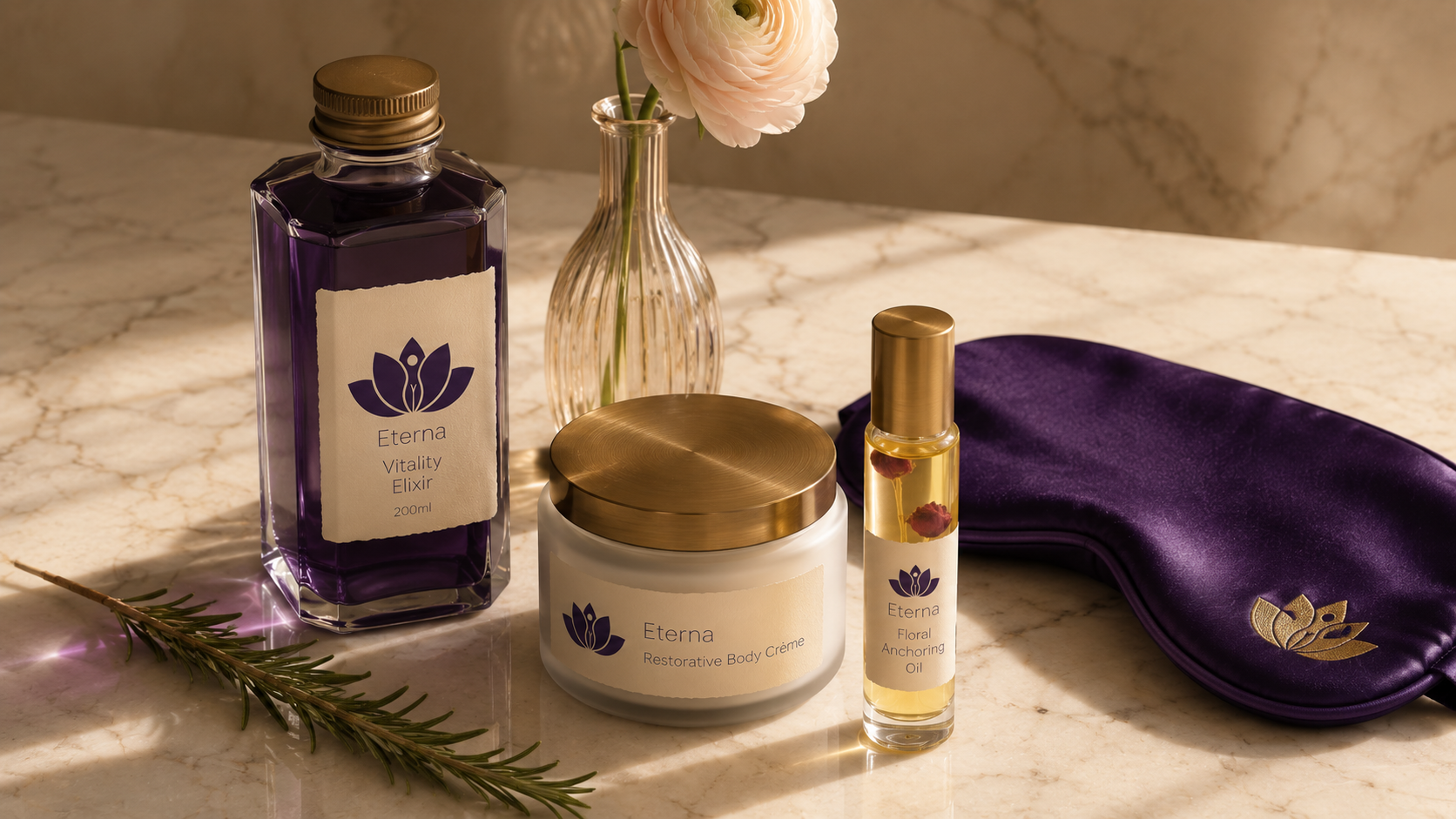ETERNA Wellness Ritual product still life — tall hexagonal apothecary bottle of royal-purple Vitality Elixir, opal-glass Restorative Body Crème jar with antique-brass cap, slim glass Floral Anchoring Oil roller, all with the lotus+figure mark on cream deckled labels, fluted champagne bud-vase with single ranunculus, folded royal-purple silk eye-mask with gold-embroidered Eterna mark, rosemary sprig, on cream-grey veined marble
