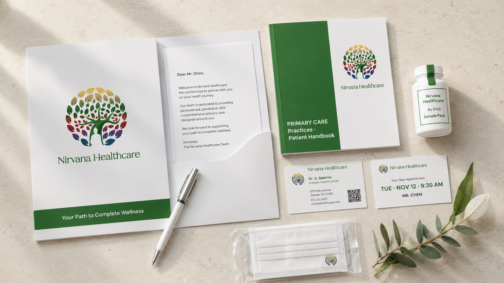 Nirvana Healthcare patient welcome packet flat-lay — white folder with full-color tree-of-life mark and Nirvana Healthcare green script + Your Path to Complete Wellness bar, personalized Dear Mr. Chen letter, kelly-green Patient Handbook, Dr. A. Salerno business card, white-and-stainless premium pen, plastic appointment card TUE NOV 12 9:30 AM for MR. CHEN, white Rx Sample Pack bottle, surgical mask in sealed packaging, on a warm cream surface